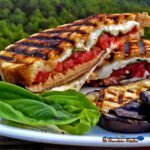 Grilled Mushroom Caprese Sandwiches are made with tomatoes, grilled mushrooms, fresh mozzarella cheese and basil filled inside rustic sourdough bread. Yum! | TheMountainKitchen.com