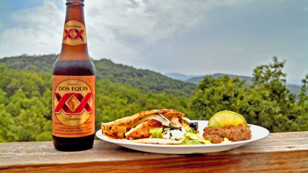 Grilled tequila-lime chicken fajitas: chicken breasts marinated in Mexican flavors, grilled, and placed inside a toasted tortilla with unlimited toppings. | TheMountainKitchen.com