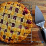 homemade cherry pie ready to slice
