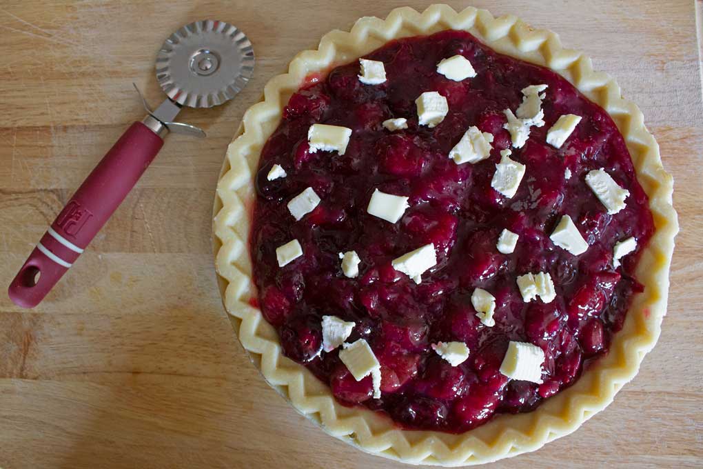 cherry pie filling dotted with butter