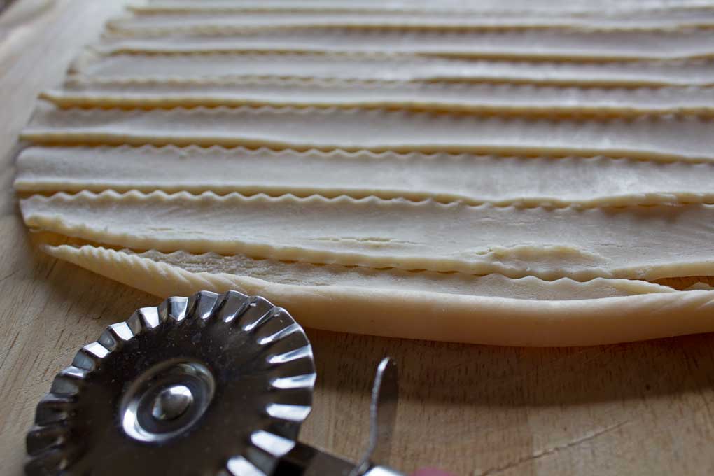 pie crust cut into strips with pastry wheel