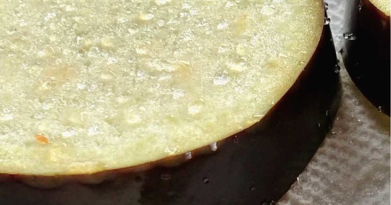 Salting eggplant draws out juices, tightens and firms up the flesh, making the eggplant less likely to soak up as much oil and of course, salt adds flavor. | TheMountainKitchen.com