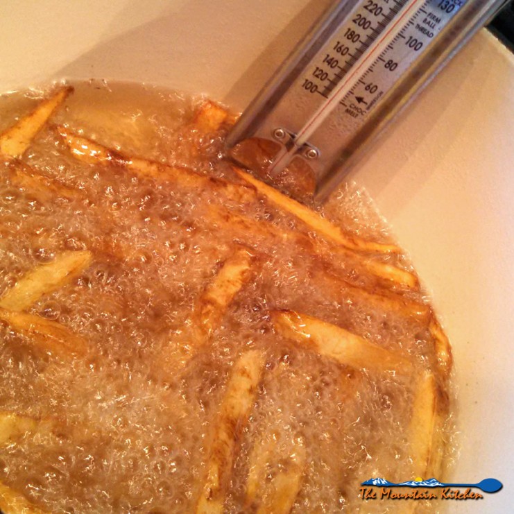 french fries cooking in hot grease