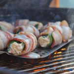 These grilled bacon wrapped jalapeño poppers are stuffed with two different cheeses, wrapped in bacon and grilled until crispy and bursting with flavor! | TheMountainKitchen.com
