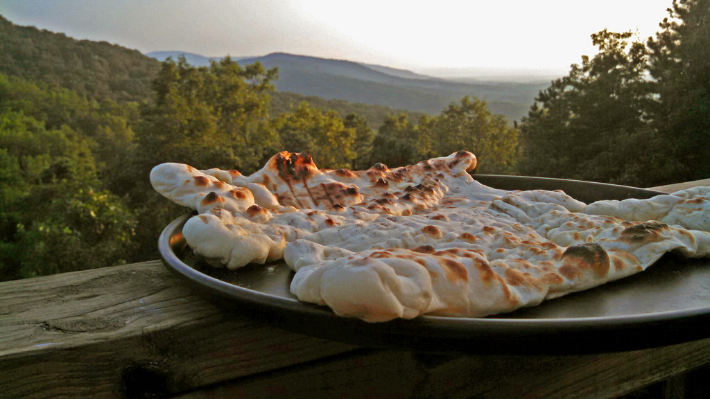 grilled pizza crust with mountain view
