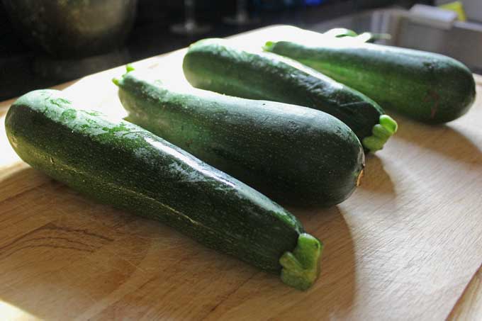 zucchini on carving board