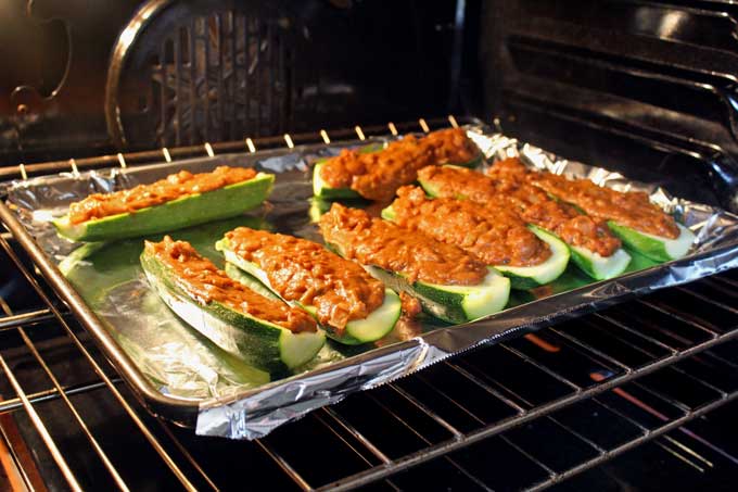 meatless Mexican zucchini boats on sheet pan in oven