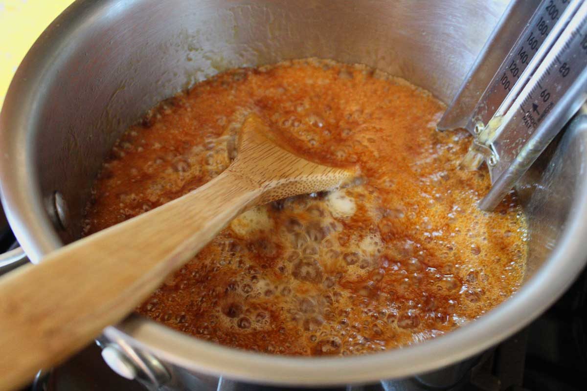 butter added to caramel in saucepan