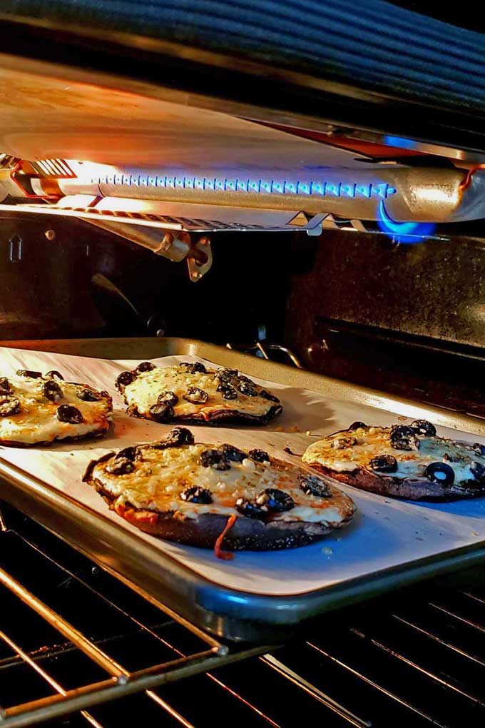 portobello mushroom cap pizzas under broiler