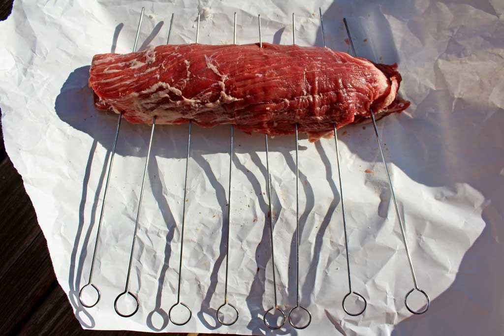 rolled flank steak with skewers