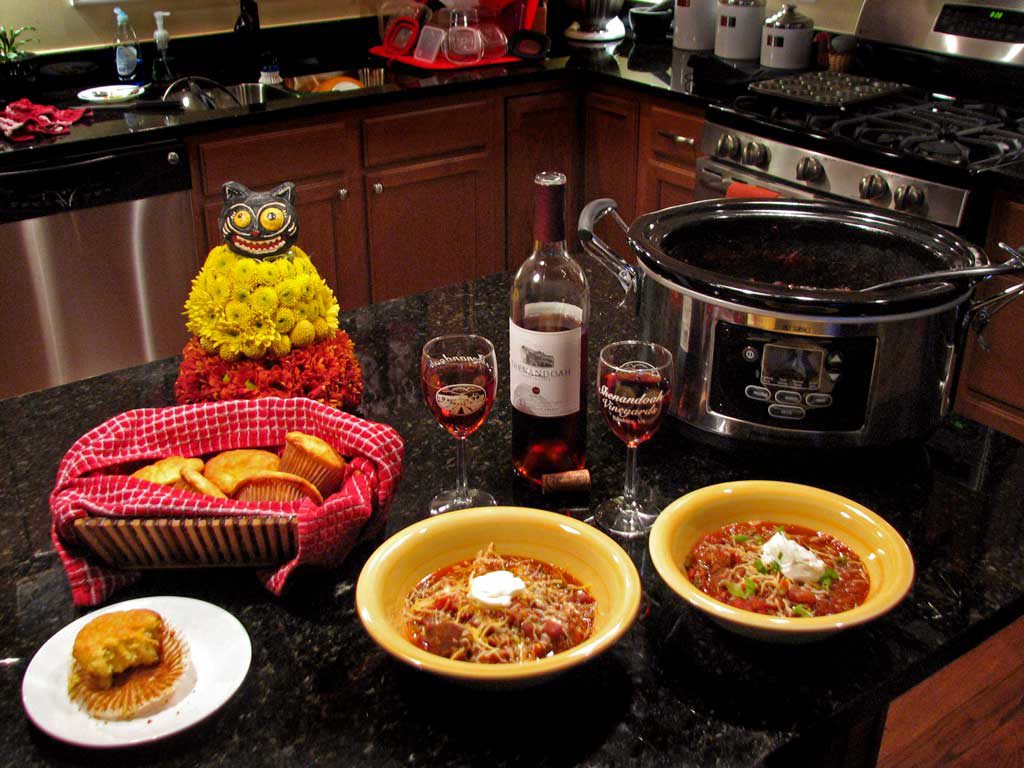 Our slow cooker chili is made in a crock-pot with chunks steak and ground beef, beans, tomatoes, fresh chili sauce and even some coffee for extra richness. | TheMountainKitchen.com