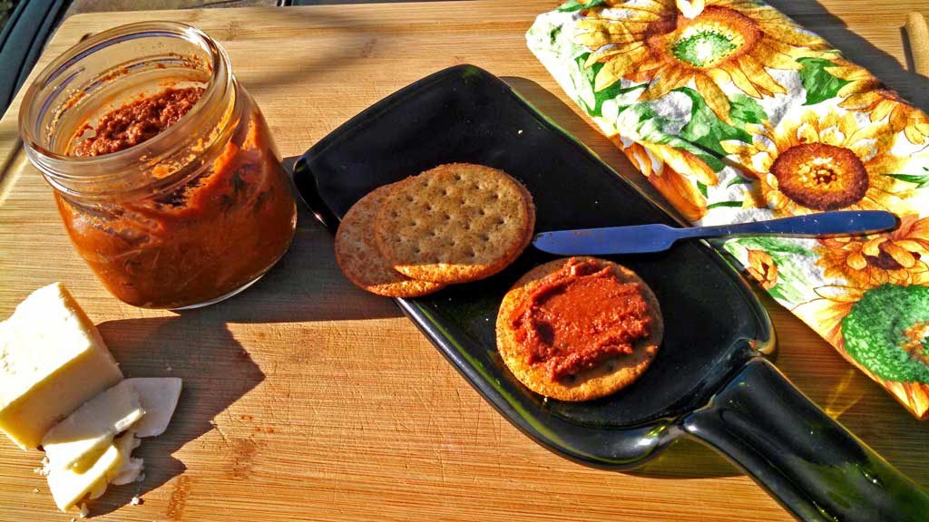 sun-dried tomato pesto spread on cracker