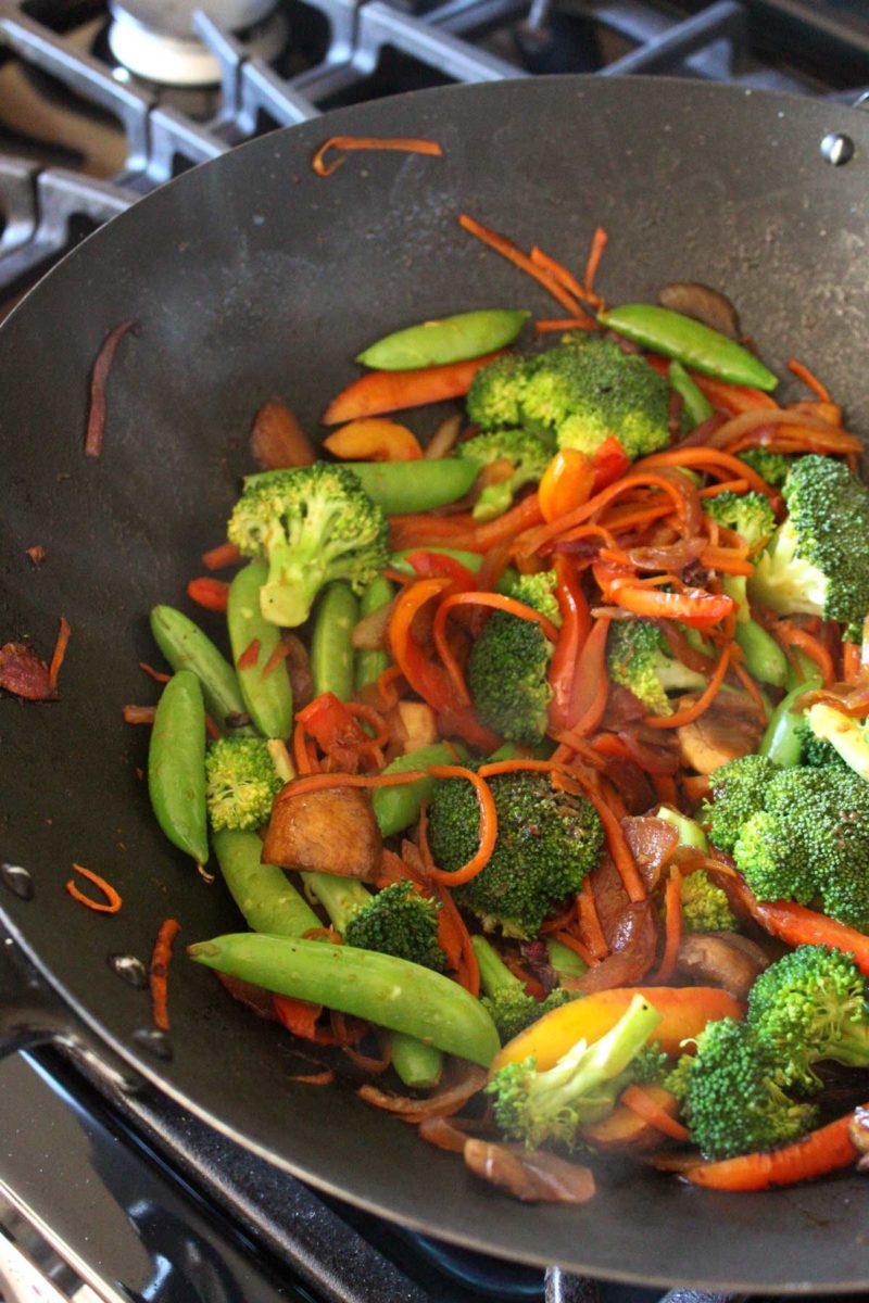 vegetables cooking in a wok