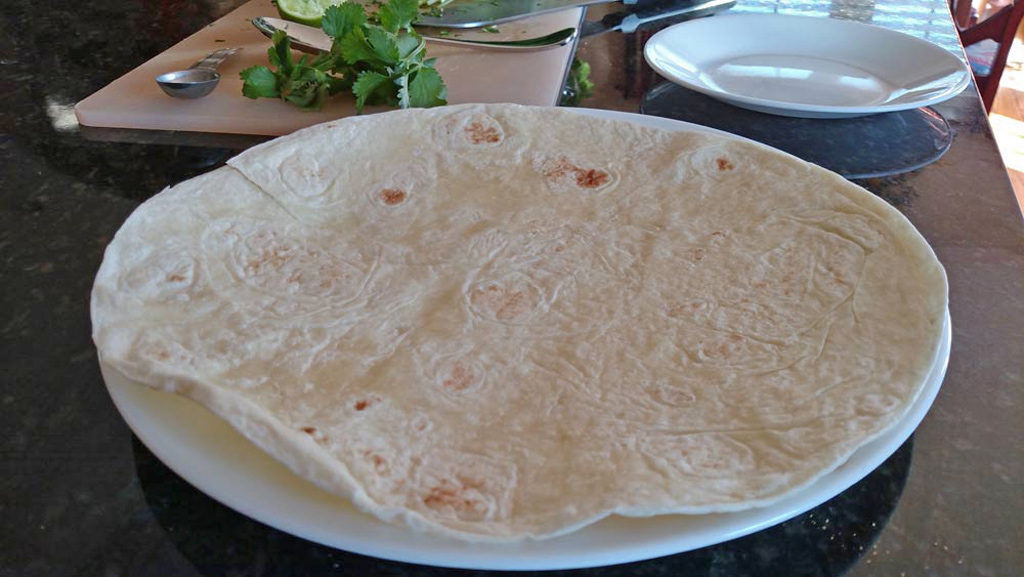 tortilla laying on plate