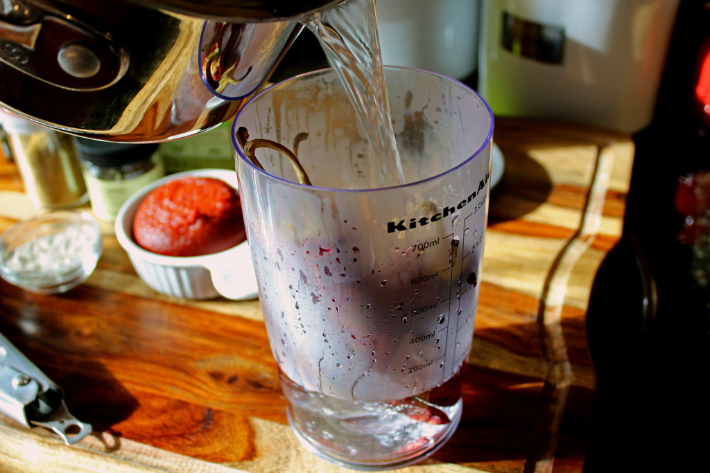 pouring hot water for chilies