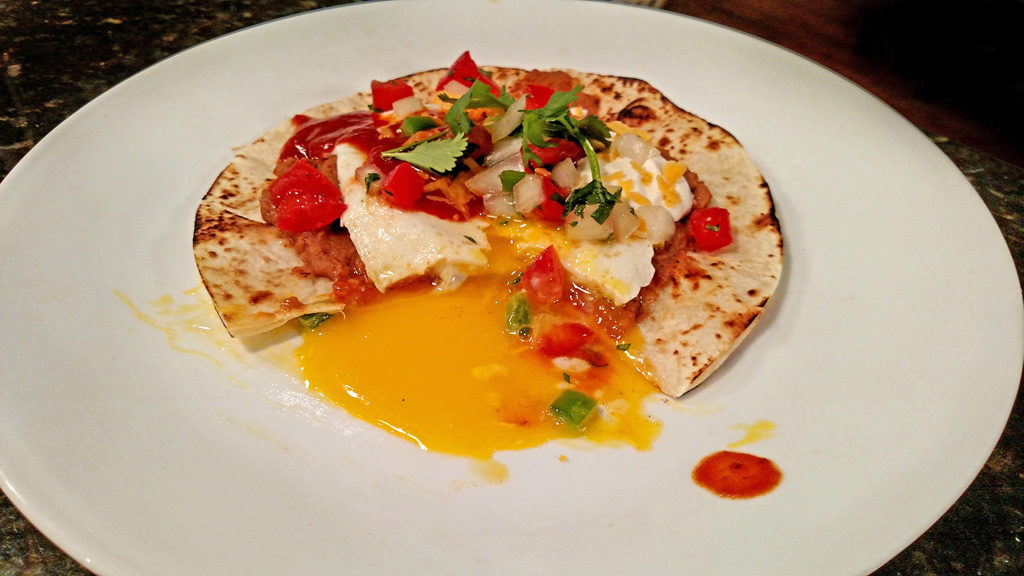 Huevos Rancheros on a plate ready to eat