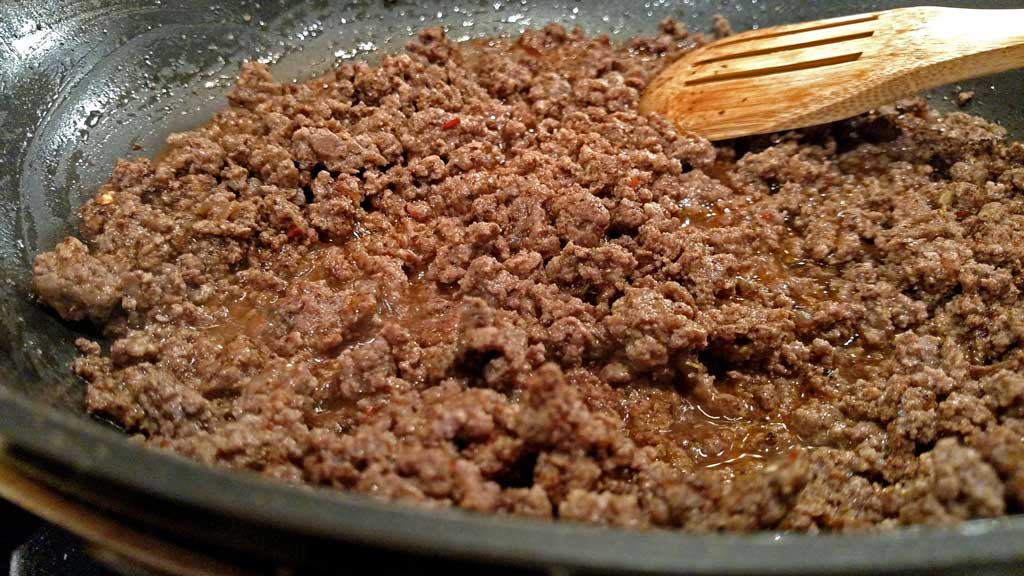 ground beef cooking in skillet