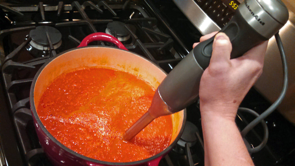 blending soup in pot with immersion blender