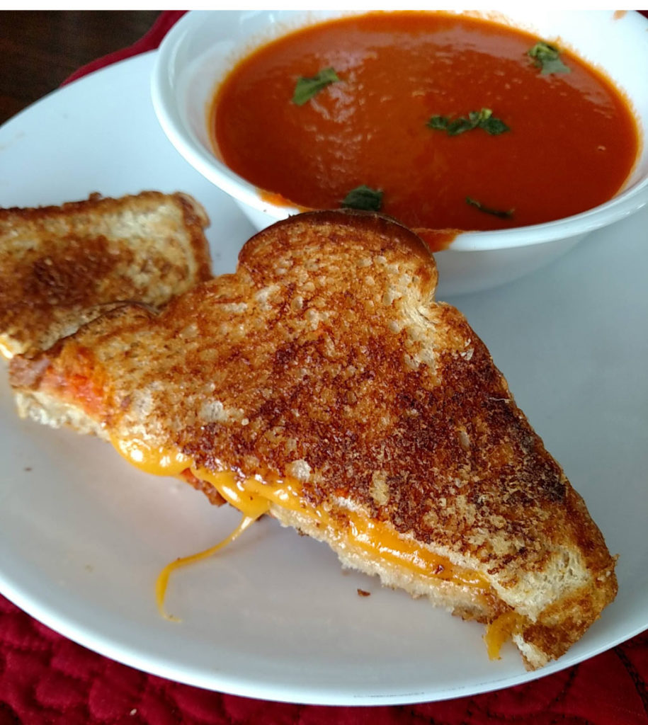 This Pioneer tomato soup is comfort food that is perfect paired with your favorite grilled cheese sandwich. Make a double batch and freeze for another day! | TheMountainKitchen.com