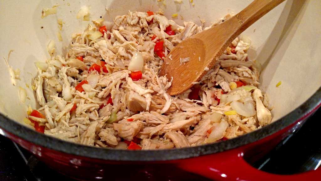 chicken and peppers in pot