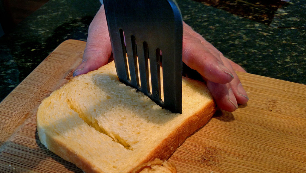 Eggs in a basket is a quick and easy breakfast, these eggs are fried inside a hole cut into a slice of bread and topped with melted cheese. | TheMountainKitchen.com
