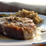 Sexy swordfish fillets smothered in a wonderful zesty sauce made of white wine, chicken broth, and garlic then finished off with lemon and fresh herbs. | TheMountainKitchen.com