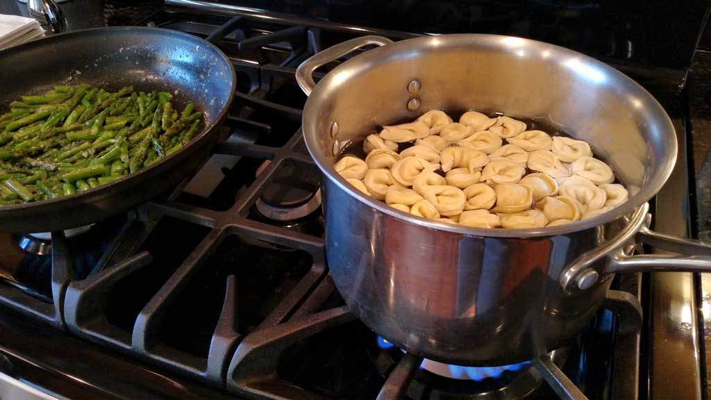 This simple spring pasta dish of Brown Butter Tortellini with Toasted Garlic and Asparagus is rich with nutty brown butter that packs big flavor. | TheMountainKitchen.com