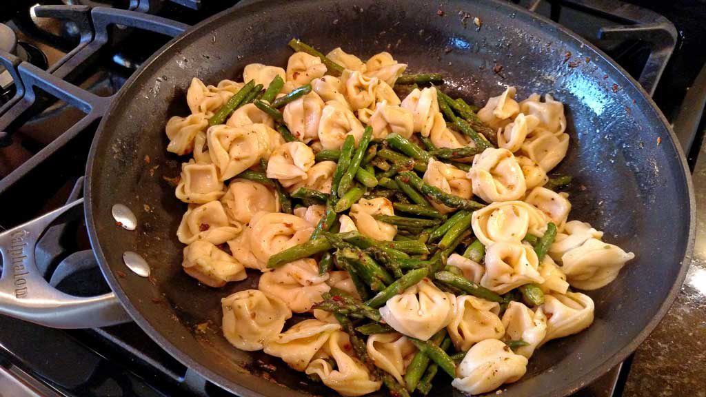 This simple spring pasta dish of Brown Butter Tortellini with Toasted Garlic and Asparagus is rich with nutty brown butter that packs big flavor. | TheMountainKitchen.com