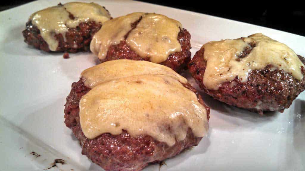 grilled cheese burgers on platter
