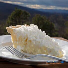 slice of coconut cream pie ready to eat