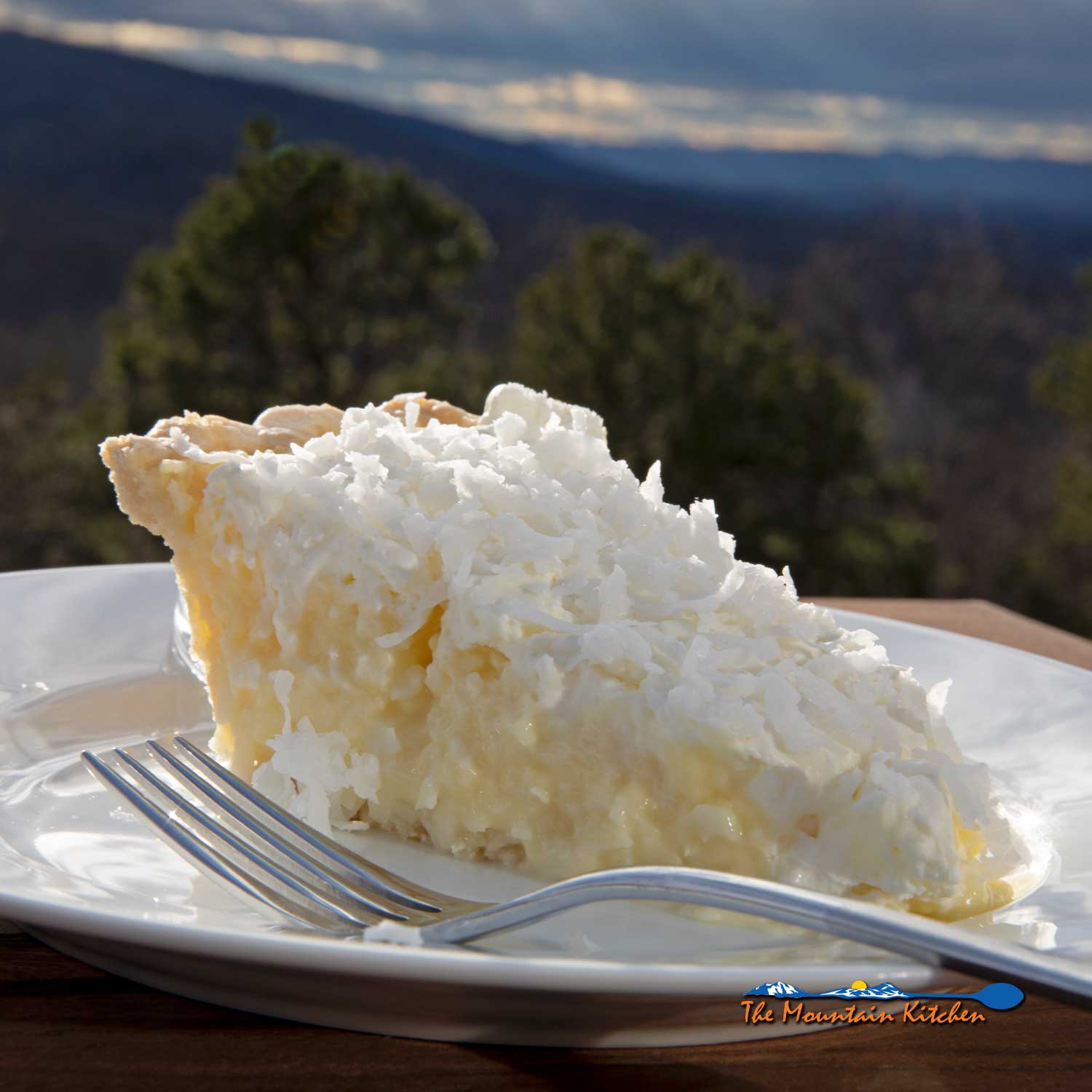 slice of coconut cream pie ready to eat