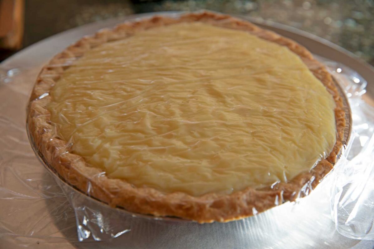 pie covered with plastic wrap