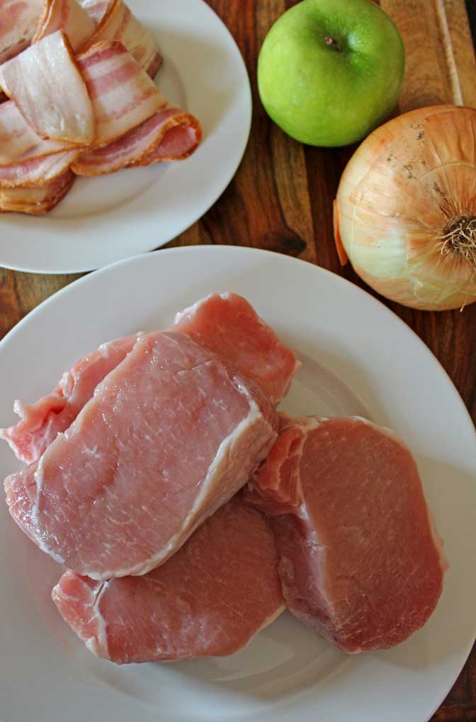 pork chops with ingredients on board