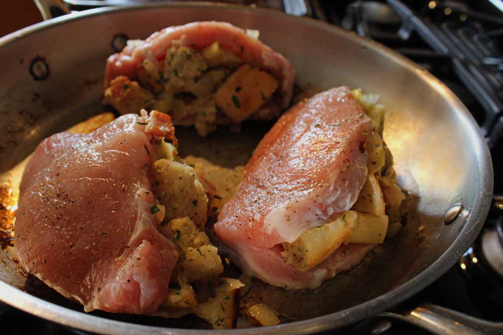stuffed pork chops in the pan