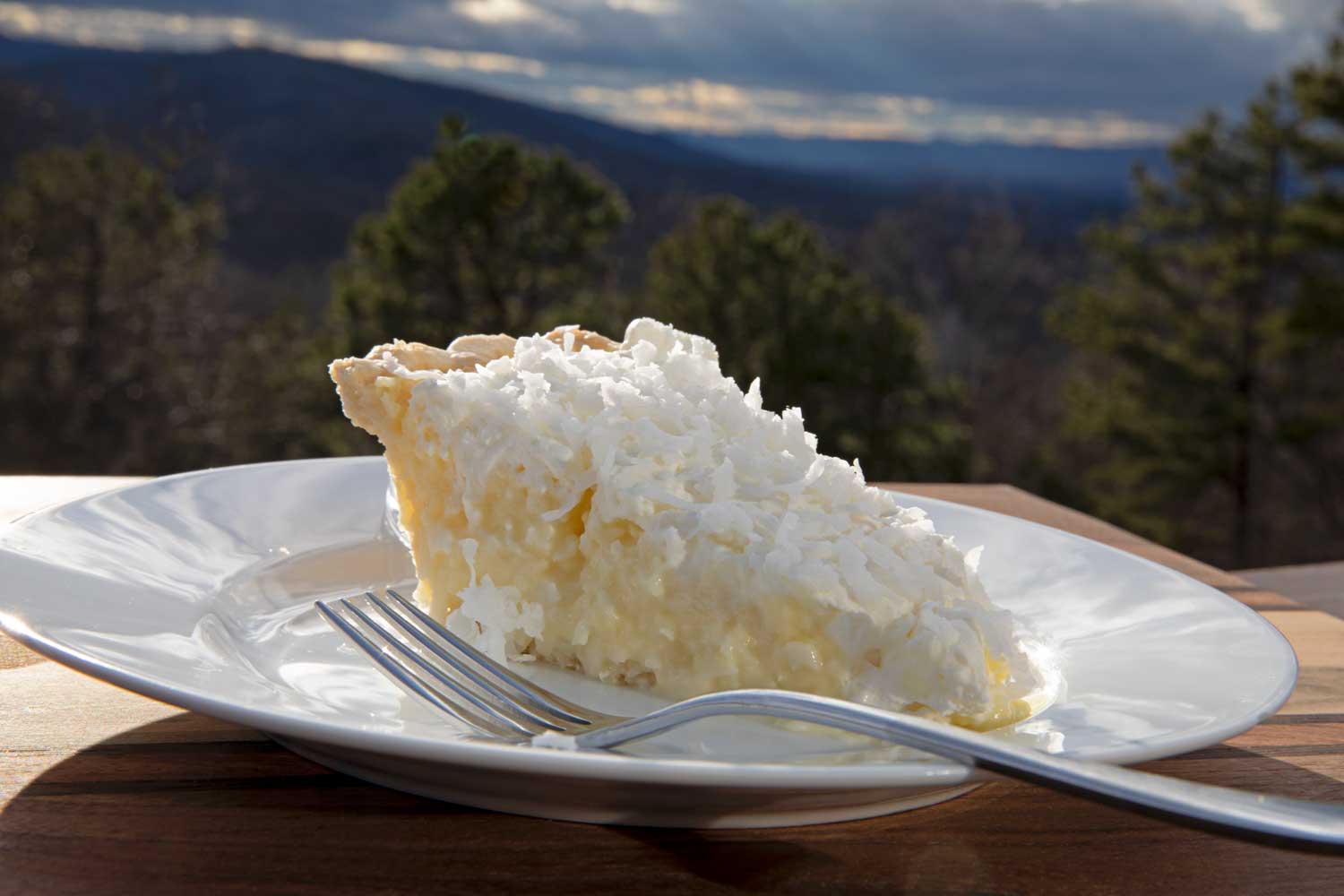 slice of coconut cream pie on plate