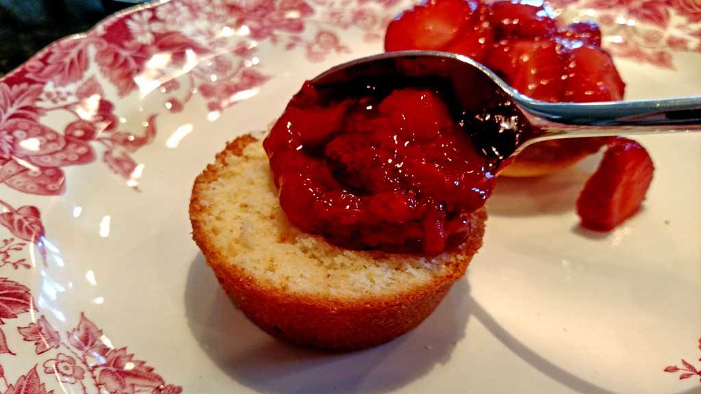 Strawberry Shortcake Surprise is made with light fluffy shortcake cupcakes covered in thick syrupy strawberry compote, fresh strawberries and whipped cream. | TheMountainKitchen.com