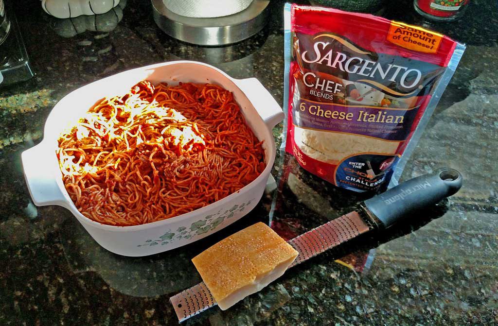 Baked spaghetti turns leftovers a brand new identity that perhaps even your pickiest eater will love! It's quick, simple and perfect for a weeknight! | TheMountainKitchen.com