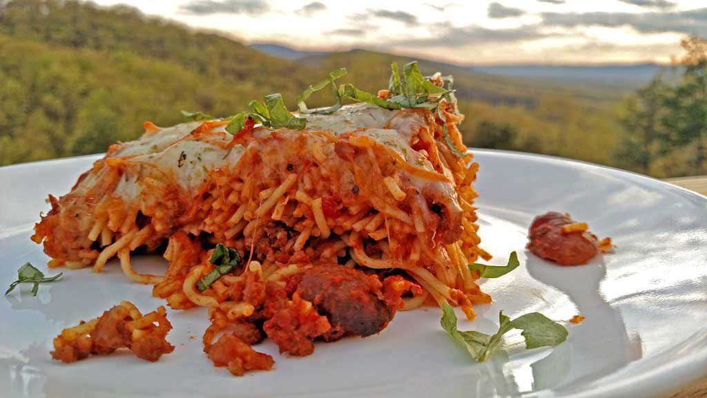 Baked spaghetti turns leftovers a brand new identity that perhaps even your pickiest eater will love! It's quick, simple and perfect for a weeknight! | TheMountainKitchen.com