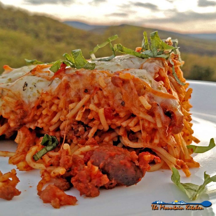 Baked spaghetti turns leftovers a brand new identity that perhaps even your pickiest eater will love! It's quick, simple and perfect for a weeknight! | TheMountainKitchen.com