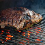 carne asada cooking on grill