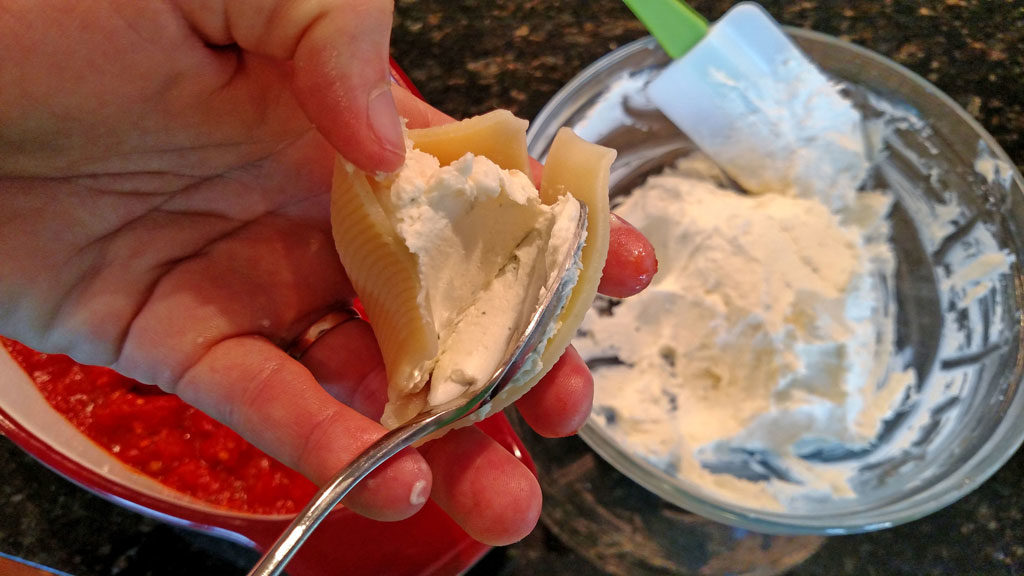 Using both homemade sauce and ricotta cheese, this Meatless Monday ricotta cheese stuffed shells recipe is pure comfort food. You'll forget it's meatless! | TheMeatlessMonday.com
