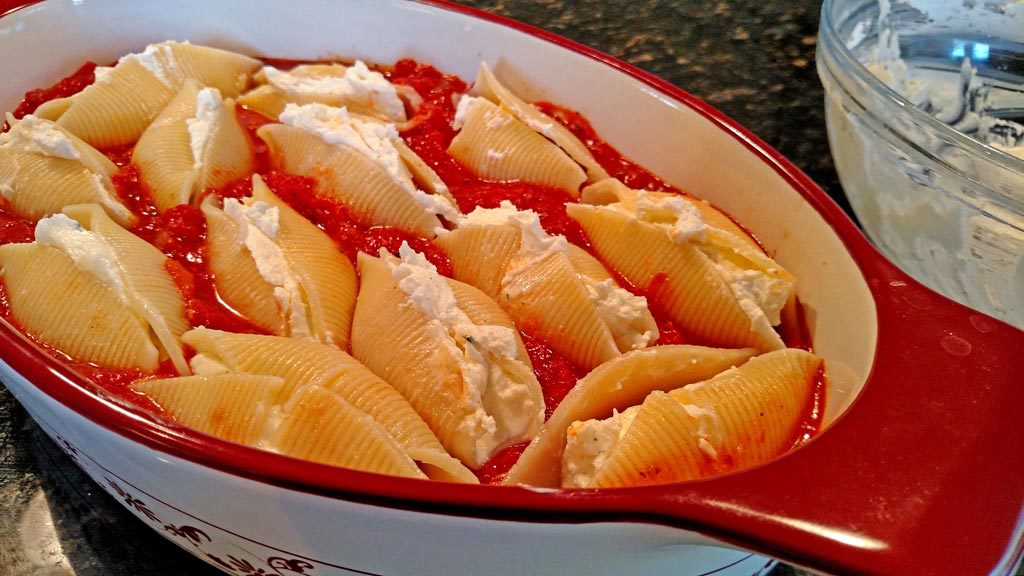 Using both homemade sauce and ricotta cheese, this Meatless Monday ricotta cheese stuffed shells recipe is pure comfort food. You'll forget it's meatless! | TheMeatlessMonday.com