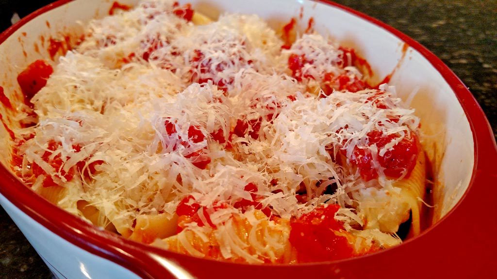 Using both homemade sauce and ricotta cheese, this Meatless Monday ricotta cheese stuffed shells recipe is pure comfort food. You'll forget it's meatless! | TheMeatlessMonday.com
