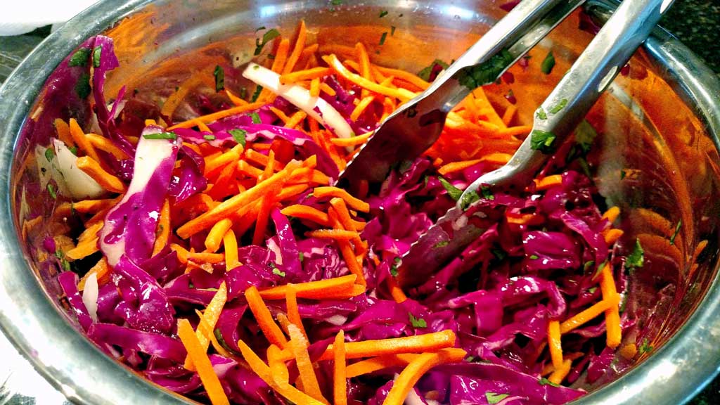 The Mountain Kitchen Fish Tacos are made with seared mahi-mahi, on a tortilla dressed with chipotle sour cream and topped with a light, fresh citrus slaw. | TheMountainKitchen.com