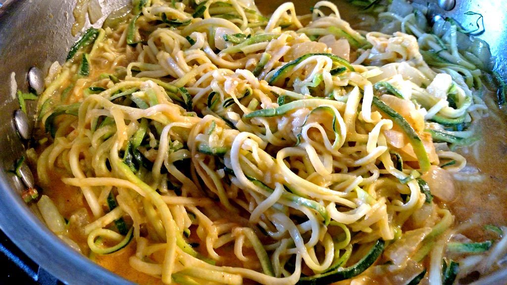 Zucchini noodles with creamy roasted red pepper sauce is a flavorful alternative if you have special dietary needs or just trying to dodge carbs. | TheMountainKitchen.com