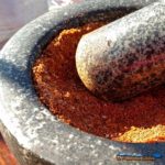 mortar and pestle with spices inside