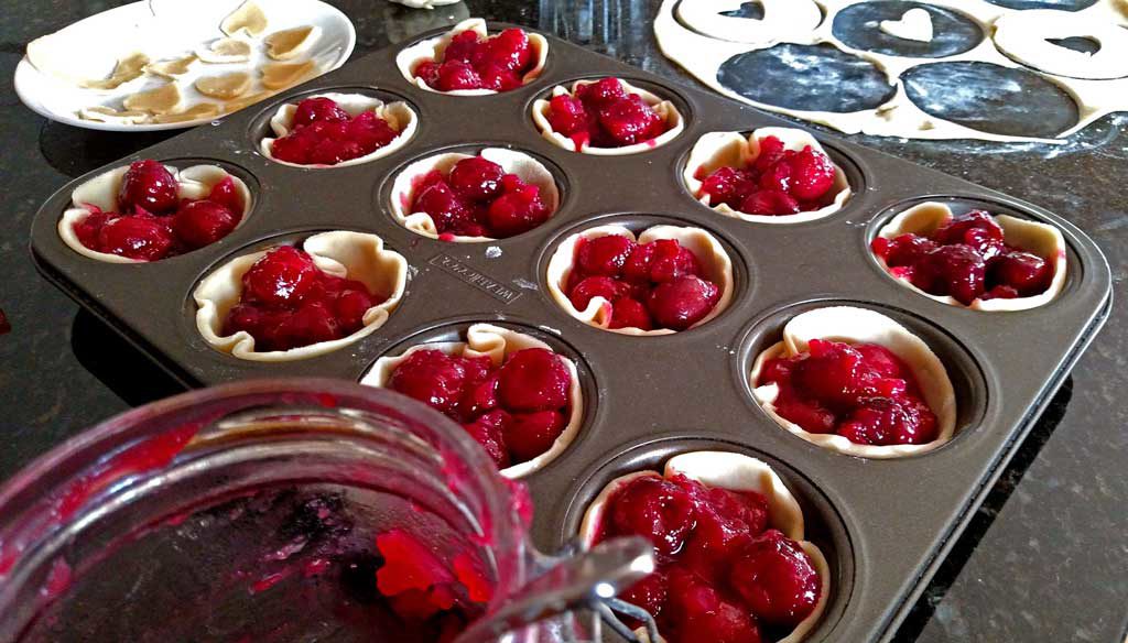 Easy to make, with fresh sweet cherries, these easy mini cherry pies are just as delicious as a full size pie, only cuter! | TheMountainKitchen.com