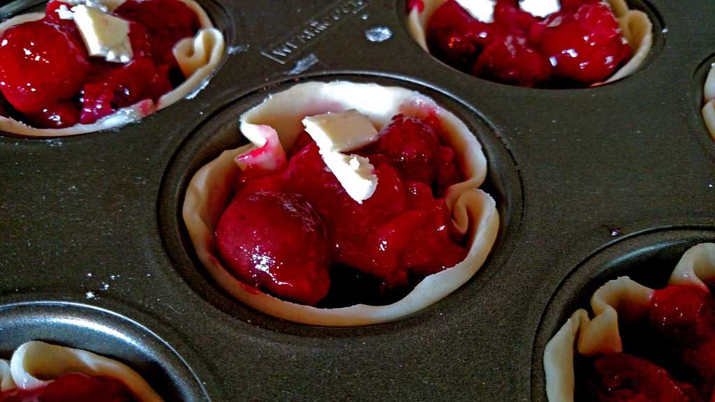 Easy to make, with fresh sweet cherries, these easy mini cherry pies are just as delicious as a full size pie, only cuter! | TheMountainKitchen.com