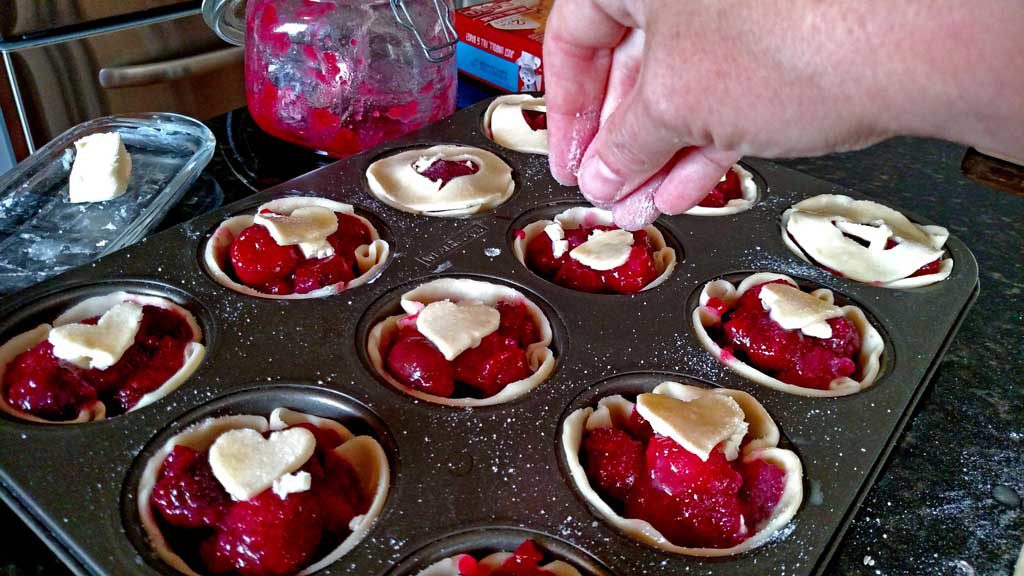 Easy to make, with fresh sweet cherries, these easy mini cherry pies are just as delicious as a full size pie, only cuter! | TheMountainKitchen.com