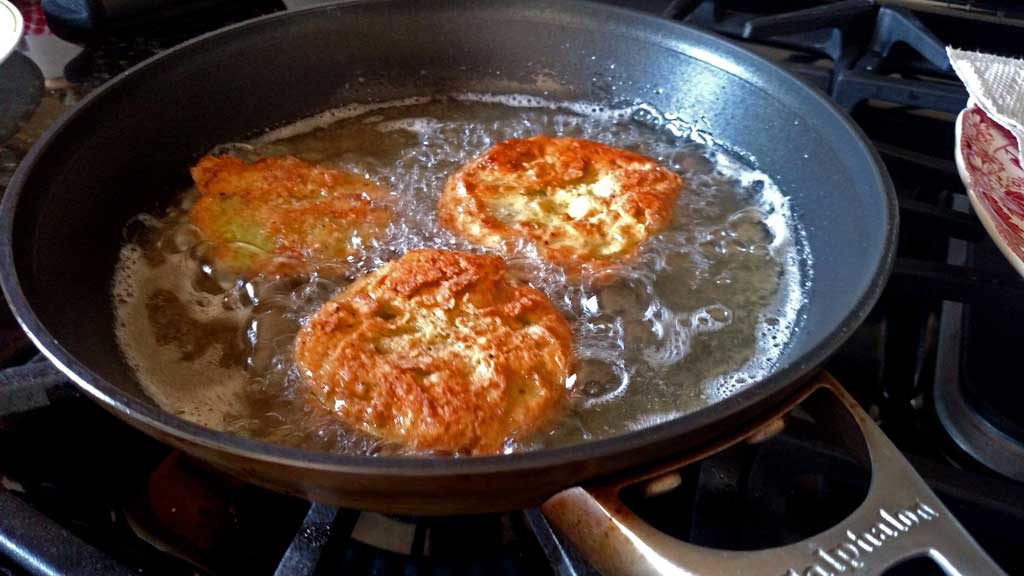 Firm tangy, crisp fried green tomato slices take on a whole new meaning with salty ham and sour mayo dressing in these fried green tomato sandwiches. | TheMountainKitchen.com
